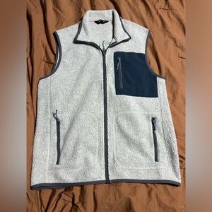 Orvis Sherpa fleece vest with navy blue pocket